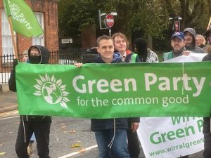 Councillor Tom Crone with Green Party banner